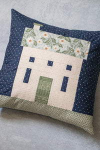 "Country Home" pillow in True Love fabric by Lella Boutique for Moda Fabrics (May 2026). This patchwork house block is fun to make and easy to turn into a pillow. Download the PDF here.