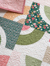 Load image into Gallery viewer, "Dishes" beginner curve quilt using the Circle Savvy Ruler and a Layer Cake. Fabric is Garden Glam by Lella Boutique for Moda Fabrics. Download the PDF here!