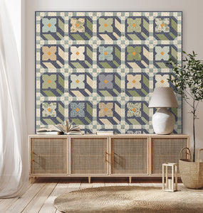 "Flower Press" geometric flower quilt by Lella Boutique. Layer Cake friendly - fabric is True Love by Lella Boutique for Moda Fabrics. Download the PDF here.
