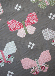 Flutter simple butterfly quilt pattern by Lella Boutique. Cute simple butterfly block made using fat eighths. Fabric is Lovestruck by Lella Boutique for Moda Fabrics.