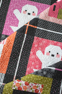 "Ghost Town" quilt by Lella Boutique featuring cute haunted house quilt blocks and friendly ghosts. Fabric is Hey Boo by Lella Boutique for Moda Fabrics (April 2024).