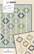 Load image into Gallery viewer, "Chandelier 2" cascading diamond quilt featuring a jelly roll or layer cake by Vanessa Goertzen. Fabric is True Love by Lella Boutique for Moda Fabrics. Download the PDF here!
