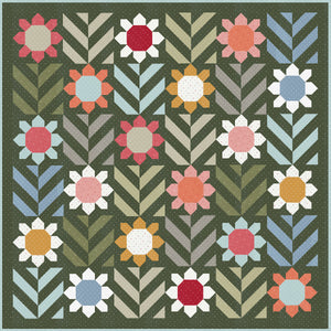 "Spring Fling" geometric flower quilt by Lella Boutique. Fat quarter quilt. Fabric is Magic Dot by Lella Boutique for Moda Fabrics. Download the PDF here!