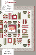 Jolly Holiday Christmas quilt by Vanessa Goertzen of Lella Boutique. Christmas medallion quilt design featuring traditionally piece Santa, holly berries and leaves, and scrappy gifts. Jelly Roll friendly! Fabric is Berry & Pine by Lella Boutique for Moda Fabrics. Download the PDF here.
