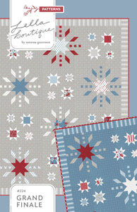 "Grand Finale" fireworks quilt by Lella Boutique. Cute 4th of July quilt reminiscent of a night filled with sparklers and exploding fireworks. Fabric is Old Glory by Lella Boutique for Moda Fabrics. Download the PDF here!