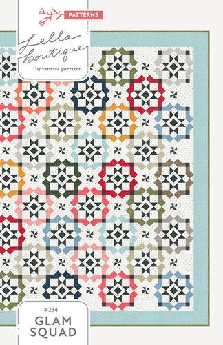 Glam Squad overlapping star tile quilt by Vanessa Goertzen of Lella Boutique. Fabric is Magic Dot by Lella Boutique for Moda Fabrics (October 2024). Make it with a dessert roll or fat eighths! Download the PDF pattern here.