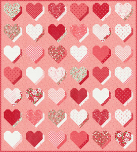 "Beloved" 3D heart quilt in Love Blooms fabric by Lella Boutique for Moda Fabrics. Fat eighth friendly. Download the PDF here.