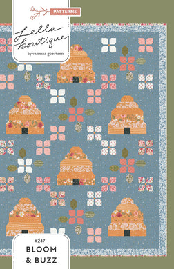 Bloom & Buzz beehive and flower quilt by Lella Boutique. Jelly Roll friendly Fabric is Wild Honey by Lella Boutique for Moda Fabrics (Nov 2025).