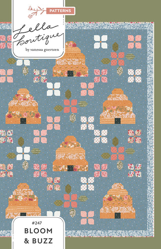 Bloom & Buzz beehive and flower quilt by Lella Boutique. Jelly Roll friendly Fabric is Wild Honey by Lella Boutique for Moda Fabrics (Nov 2025).
