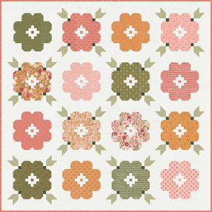 Vintage Blooms flower quilt in Wild Honey fabric by Lella Boutique for Moda Fabrics. Beautiful patchwork blooms of gold, white, pinks, and green are the perfect way to let creativity bloom. Fat quarter friendly. Download the PDF here.