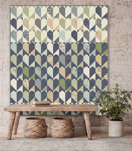 "Achy Breaky" heart quilt in True Love fabric by Lella Boutique for Moda Fabrics. Fat quarter friendly and bringing all the drama with these scrappy heart blocks. Download the PDF here