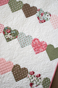 Love Day heart pattern by Lella Boutique. Simple heart pattern made with fat quarters or fat eighths. Fabric is Lovestruck by Lella Boutique for Moda Fabrics. Download the PDF here.