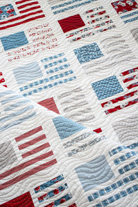 "Miss Americana" American flag quilt by Lella Boutique. Cute 4th of July quilt perfect for summertime in the USA. Fabric is Old Glory by Lella Boutique for Moda Fabrics.