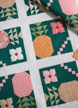 Load image into Gallery viewer, "Piña Colada" pineapple quilt by Vanessa Goertzen of Lella Boutique. Fat eighth friendly featuring pineapples, flower, and bold tropical vibes! Fabric is Garden Glam by Lella Boutique for Moda Fabrics (Nov 2026). Download the PDF here!
