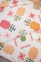 Load image into Gallery viewer, "Piña Colada" pineapple quilt by Vanessa Goertzen of Lella Boutique. Fat eighth friendly featuring pineapples, flower, and bold tropical vibes! Fabric is Garden Glam by Lella Boutique for Moda Fabrics (Nov 2026). Download the PDF here!