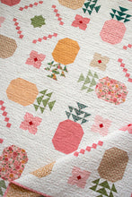 Load image into Gallery viewer, "Piña Colada" pineapple quilt by Vanessa Goertzen of Lella Boutique. Fat eighth friendly featuring pineapples, flower, and bold tropical vibes! Fabric is Garden Glam by Lella Boutique for Moda Fabrics (Nov 2026). Download the PDF here!