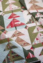 Load image into Gallery viewer, "Pine Needles" scrappy Christmas tree quilt made with a fat eighth bundle of Peppermint Cocoa fabric by Lella Boutique for Moda Fabrics. Download the PDF here!