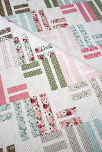 Load image into Gallery viewer, Stairway to Heaven jelly roll quilt by Vanessa Goertzen of Lella Boutique. Really cute geometric quilt in Lovestruck fabric by Lella Boutique for Moda Fabrics. Download the PDF here!