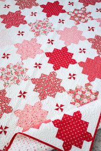 "Sugar 'n Spice" puzzle piece quilt by Vanessa Goertzen of Lella Boutique. Fat quarter friendly - fabric is Love Blooms by Lella Boutique for Moda Fabrics. Download the PDF here.