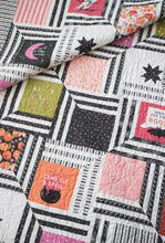 Load image into Gallery viewer, &quot;The Web&quot; modern Halloween quilt in Hey Boo fabric by Lella Boutique for Moda Fabrics. Modern spider web quilt using a Layer Cake and/or the Hey Boo quilt panel. Download the PDF pattern here!
