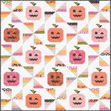 Load image into Gallery viewer, &quot;Tricks &amp; Treats&quot; candy quilt featuring pumpkins and candy corn pinwheels. Fabric is Hey Boo by Lella Boutique for Moda Fabrics (April 2024). Download the PDF pattern here!