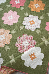 "Vintage Blooms" flower quilt by Lella Boutique. These beautiful patchwork blooms feature Wild Honey fabric by Lella Boutique for Moda Fabrics (Nov 2025). Fat quarter friendly!