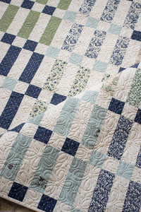 "Woven" Jelly Roll quilt pattern in True Love fabric by Lella Boutique for Moda Fabrics. Quick and easy quilt using strip piecing technique - download the PDF here!