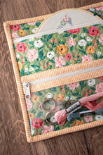 Load image into Gallery viewer, "Zip Zip Go" sweet zippered stitch bag pattern perfect for storing small projects like cross stitch or paper piecing. Fabric is Garden Glam by Lella Boutique for Moda Fabrics. Download the PDF here!