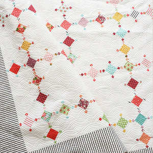 diamond dust quilt by lella boutique. cool geometric scrap quilt. Fabric is Lollipop Garden by Lella Boutique for Moda Fabrics.
