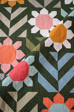Load image into Gallery viewer, &quot;Spring Fling&quot; geometric flower quilt. Fat quarter quilt. Fabric is Magic Dot by Lella Boutique for Moda Fabrics (Oct 2024).