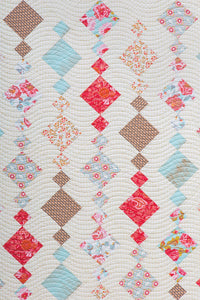 Chandelier diamond quilt from the book: Charm School - 18 Quilts from 5" Squares by Vanessa Goertzen of Lella Boutique. Get your autographed copy of the book here! Lots of great charm pack quilts. Fabric is Chatsworth by Emily Taylor for Riley Blake Designs