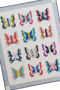 Madame Butterfly small butterfly quilt from the book: Charm School - 18 Quilts from 5" Squares by Vanessa Goertzen of Lella Boutique. Get your autographed copy of the book here! Lots of great charm pack quilts. Fabric is assorted Cotton + Steel prints.