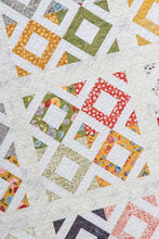 Load image into Gallery viewer, Hoodwink easy diamond quilt from the book: Charm School - 18 Quilts from 5&quot; Squares by Vanessa Goertzen of Lella Boutique. Get your autographed copy of the book here! Lots of great charm pack quilts. Fabric is Mon Ami by BasicGrey for Moda Fabrics.
