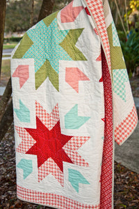 Snow Blossoms star quilt by Lella Boutique. A fat quarter quilt made in Vintage Modern fabric by Bonnie & Camille for Moda Fabrics.