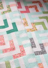Load image into Gallery viewer, Beachcomber log cabin quilt by Vanessa Goertzen of Lella Boutique. Make it with a jelly roll or layer cake. Fabric is Sugar Pie by Lella Boutique for Moda Fabrics.