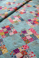 Load image into Gallery viewer, Checkerboard scrappy diamond quilt from the book: Jelly Filled - 18 Quilts from 2-1/2&quot; Strips by Vanessa Goertzen of Lella Boutique. Get your autographed copy of the book here! Lots of great jelly roll strip quilts. Fabric is Beach Road by Jen Kingwell + Grunge by BasicGrey for Moda Fabrics.