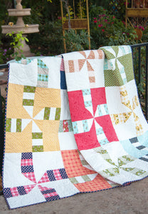 Do Si Do pinwheel quilt by Lella Boutique. Fabric is Little Miss Sunshine by Lella Boutique for Moda Fabrics. Would make a great boy quilt.