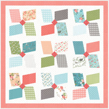 Load image into Gallery viewer, Easy Breezy large pinwheel quilt. Layer Cake friendly. Fabric is Nest by Lella Boutique for Moda Fabrics.