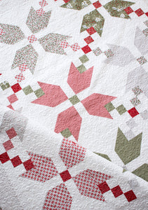 "Figgy Pudding" simple Christmas star quilt by Lella Boutique. Fat Quarter quilt. Fabric is Christmas Morning by Lella Boutique for Moda. Download the PDF here.