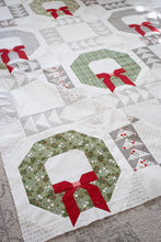 Load image into Gallery viewer, Good Tidings fat quarter Christmas wreath quilt pattern by Vanessa Goertzen of Lella Boutique. Fabric is Christmas Eve by Lella Boutique for Moda Fabrics shipping May 2023.