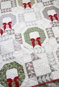 Good Tidings fat quarter Christmas wreath quilt pattern by Vanessa Goertzen of Lella Boutique. Fabric is Christmas Eve by Lella Boutique for Moda Fabrics shipping May 2023.