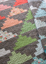 Load image into Gallery viewer, Summit pyramid quilt. Jelly roll quilt made in Nest fabric by Lella Boutique for Moda Fabrics.