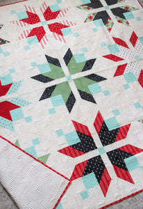 Icebox nordic snowflake quilt by Lella Boutique. Beautiful Christmas quilt in Little Tree fabric by Lella Boutique for Moda Fabrics. Fat quarter friendly. Download the PDF here!