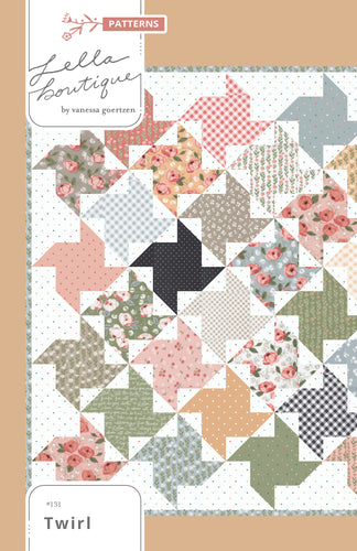 Twirl layer cake windmill quilt by Lella Boutique. Make it with a layer cake and charm packs, fat quarters, or fat eighths. Fabric is Country Rose by Lella Boutique for Moda Fabrics.