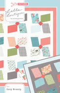 Easy Breezy large pinwheel quilt by Lella Boutique. Layer Cake friendly. Fabric is Nest by Lella Boutique for Moda Fabrics.
