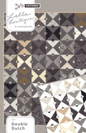 Double Dutch geometric triangle quilt by Lella Boutique. Make it with fat quarters or fat eighths. Fabric is Stiletto by BasicGrey for Moda Fabrics.