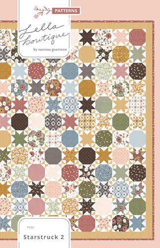 Starstruck 2 beautiful bursting star quilt featuring sawtooth stars. Fat quarter quilt or layer cake quilt. Fabric is Folktale by Lella Boutique for Moda Fabrics.