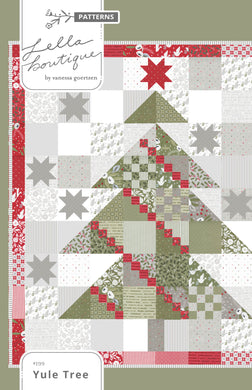 Yule Tree scrappy Christmas tree quilt by Lella Boutique. Fabric is Christmas Morning by Lella Boutique for Moda Fabrics.