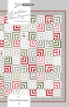 Load image into Gallery viewer, Kaleidoscope 2 hypnotic quilt design. Honeybun quilt (made with 1.5&quot; strips). Fabric is Christmas Morning by Lella Bourique for Moda. Download the PDF here.