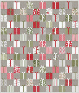 Gift Swap charm pack quilt by Lella Boutique. Cute Christmas present quilt in Christmas Morning fabric by Lella Boutique for Moda Fabrics. Make it with charm packs, fat quarters, or scraps.